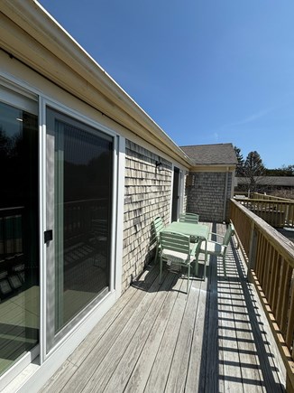 West Dennis Cape Cod vacation rental - Deck overlooking complex's backyard and inground pool.