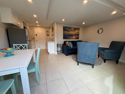 West Dennis Cape Cod vacation rental - Living room, kitchen, dining area.