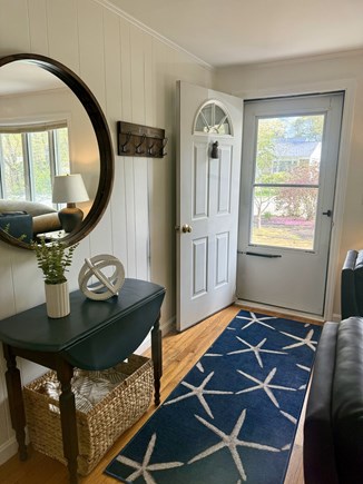 Falmouth, New Silver Beach Cape Cod vacation rental - Breezy Cape Cod screen door to the cheery entryway.