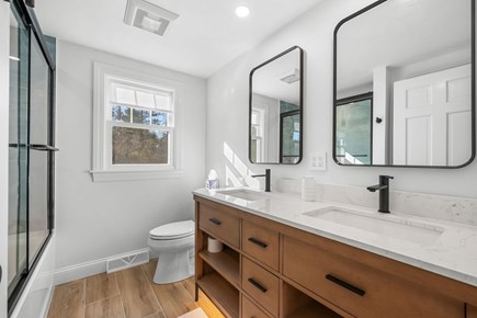 East Sandwich Cape Cod vacation rental - 1st floor bathroom with shower/tub combo & double vanity