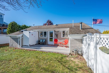 Sandwich Cape Cod vacation rental - Back deck with outdoor shower and seating area