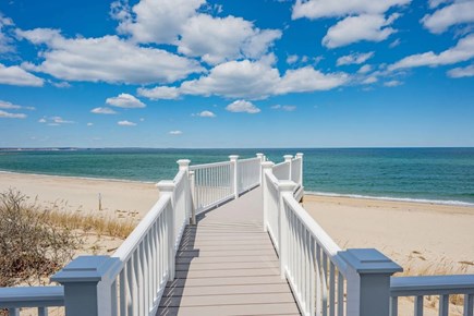 East Sandwich Cape Cod vacation rental - Walkway leading off the back deck to the beach