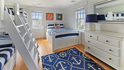 East Falmouth Cape Cod vacation rental - Second floor bedroom with queen bed and two bunks