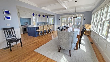 East Falmouth Cape Cod vacation rental - Dining area with kitchen beyond