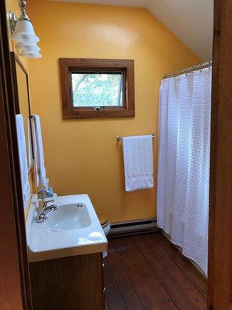 Truro Cape Cod vacation rental - Upstairs bathroom with shower/tub