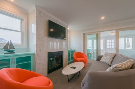 East Sandwich Cape Cod vacation rental - Living area with TV and fireplace.