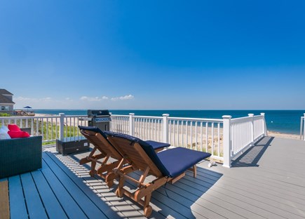 East Sandwich Cape Cod vacation rental - Deck with patio furniture, grill, and private stairway to the beach.
