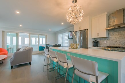 East Sandwich Cape Cod vacation rental - Fully equipped kitchen with guest seating at the island.