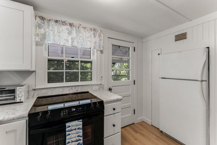 East Orleans Cape Cod vacation rental - A door to the back porch and outdoor shower.