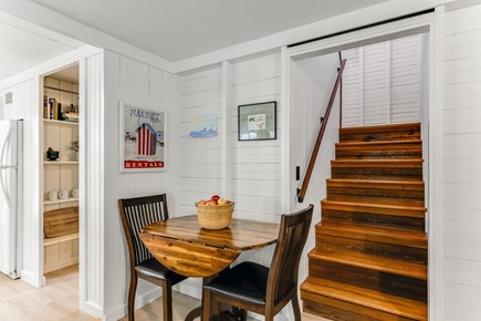 East Orleans Cape Cod vacation rental - Dining area and stairs leading to the second level.