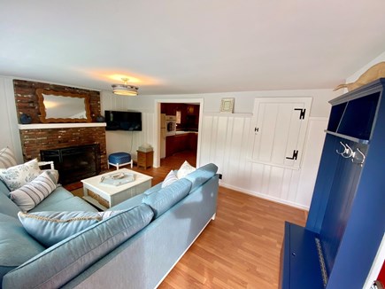 Popponesset Cape Cod vacation rental - Living room with fireplace. Smart TV and plenty of seating.