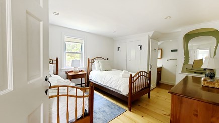 Truro Cape Cod vacation rental - Bedroom with two twins and ensuite half bathroom