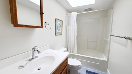 Truro Cape Cod vacation rental - Queen bedroom ensuite bathroom with tub/shower
