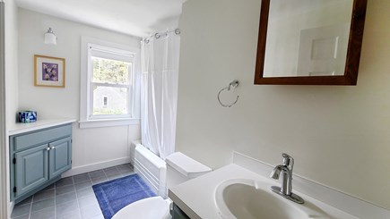 Truro Cape Cod vacation rental - Bathroom with tub/shower accessed by hall an full bedroom