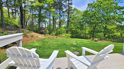 Truro Cape Cod vacation rental - Backyard with wooded view and path to road to Ballston