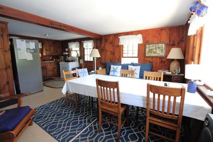 Wellfleet Cape Cod vacation rental - Dining Space with Couch and Kitchen in Background