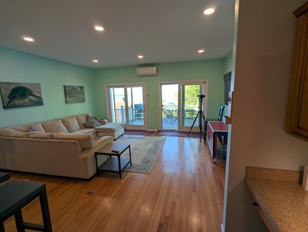 Plymouth, Cedarville Landing MA vacation rental - View from the kitchen to living room and out to the deck/water