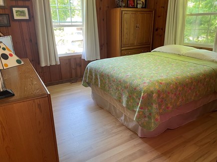 East Falmouth Cape Cod vacation rental - Master bedroom. Queen bed, lots drawer space and closet. Small TV
