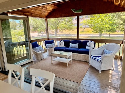 Dennisport Cape Cod vacation rental - Big screened in porch extends the size of the kitchen.