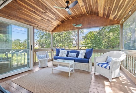 Dennisport Cape Cod vacation rental - Large sliding door opens to screened in porch