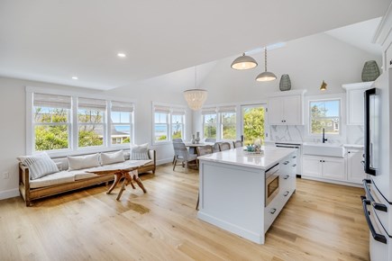 Eastham Cape Cod vacation rental - Open-concept living room, dining room, and kitchen
