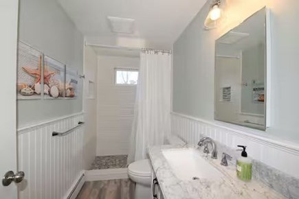 Dennis Cape Cod vacation rental - RENOVATED bathroom with step in shower.