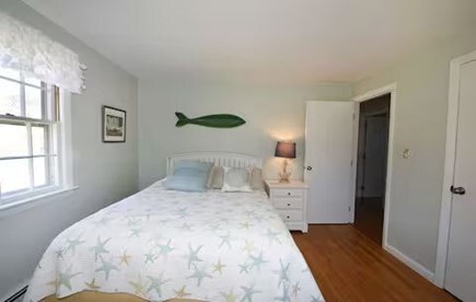 Dennis Cape Cod vacation rental - Bedroom 1 Queen bed - bedside table and dresser
