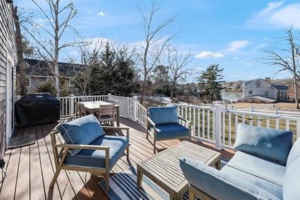 Falmouth Cape Cod vacation rental - Dining with a view - expansive deck with grill