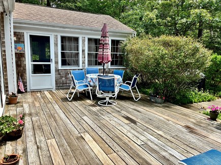 Wellfleet Cape Cod vacation rental - Outdoor porch with table/chairs and 2 large lounge recliners
