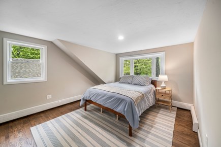 Yarmouth Cape Cod vacation rental - Spacious primary bedroom with a charming bay window view
