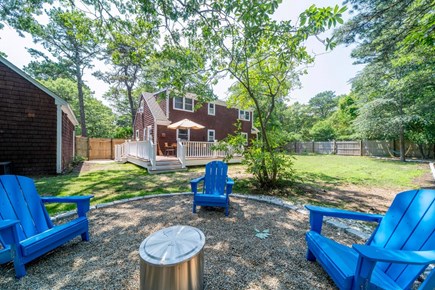 Yarmouth Cape Cod vacation rental - Enjoy s’mores and stories by the backyard firepit