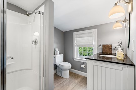 South Yarmouth Cape Cod vacation rental - Primary bathroom with walk in shower.