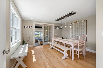 South Yarmouth Cape Cod vacation rental - Indoor dining room & entrance to the sunroom.