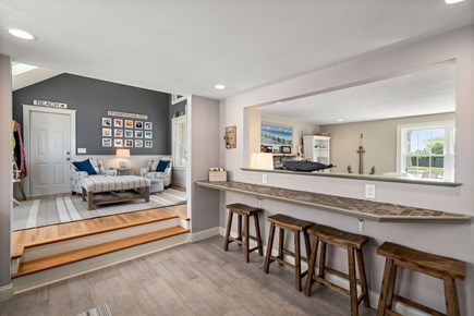 South Yarmouth Cape Cod vacation rental - Eat in kitchen, view into living room & den.