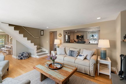 South Yarmouth Cape Cod vacation rental - Livingroom with view into the kitchen & dining room.