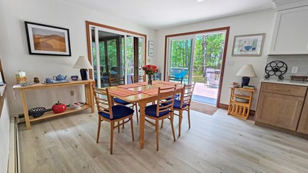 Wellfleet Cape Cod vacation rental - Dining area with sliders to screen porch and deck