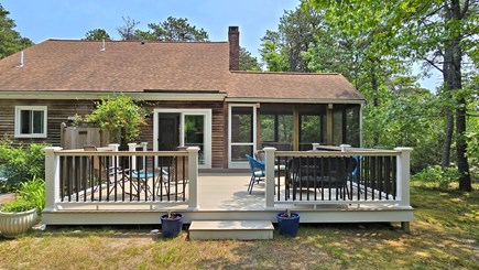 Wellfleet Cape Cod vacation rental - Backyard w/deck, outdoor shower, charcoal grill and hammock