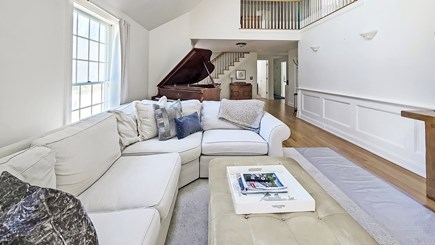 Wellfleet Cape Cod vacation rental - Vaulted living room with comfortable seating, TV & piano