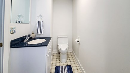 Wellfleet Cape Cod vacation rental - First floor half bathroom with washer and dryer