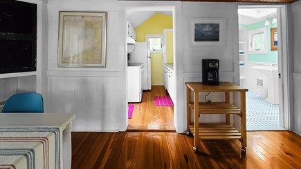 Wellfleet Cape Cod vacation rental - Dining area with kitchen and bathroom beyond