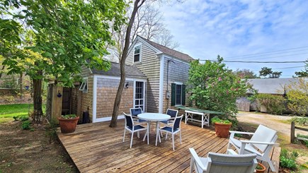 Wellfleet Cape Cod vacation rental - Deck with table, seating and enclosed outdoor shower