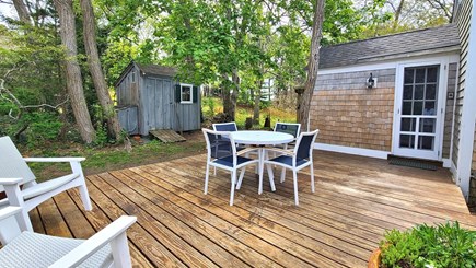 Wellfleet Cape Cod vacation rental - Deck with table, seating and enclosed outdoor shower