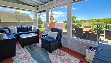 Wellfleet Cape Cod vacation rental - Wonderful screen porch with seating and large TV