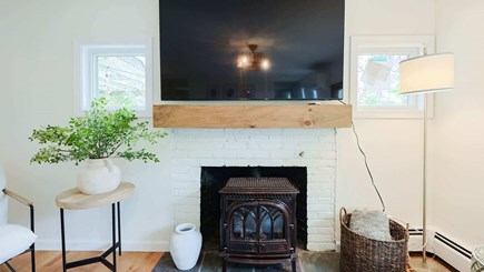 Chatham Cape Cod vacation rental - Big screen up top, woodstove below—Cape Cod comfort zone.