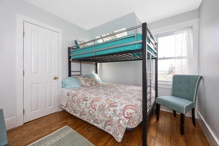 Bourne, Buzzards Bay Cape Cod vacation rental - Bunk-bed fun with playful colors and vintage vibes.