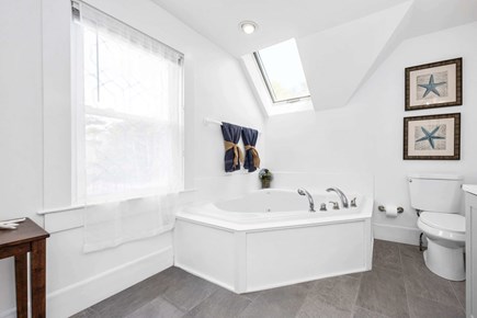 Bourne, Buzzards Bay Cape Cod vacation rental - Bright, airy bathroom blends style and function.