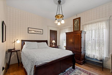 Harwich Center Cape Cod vacation rental - First floor primary bedroom - located off the formal living room