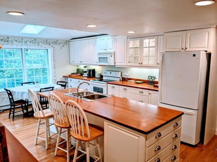 Falmouth / Woods Hole Cape Cod vacation rental - Kitchen Island to Dining Area