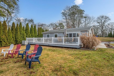 Bourne, Buzzards Bay Cape Cod vacation rental - Large deck with hot tub and dining table