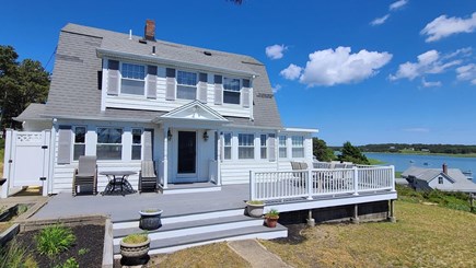 Wellfleet Cape Cod vacation rental - Home has a large deck with outdoor shower and dining table